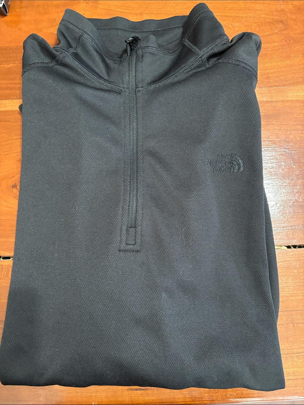 The North Face men’s  Black Half-Zip pullover
